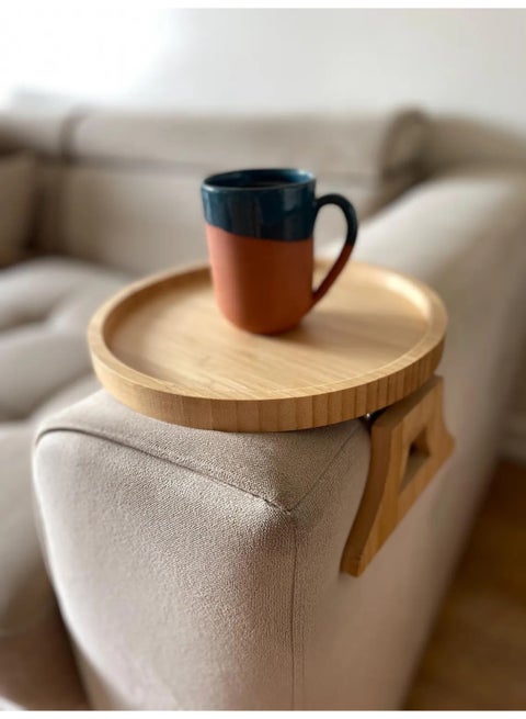A natural wood side sofa table with a sleek and modern design, easily attaches to the arm of the sofa to provide an ideal surface for drinks, snacks, or your phone.